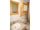 Bathroom with a vanity sink, mirror, and wood cabinet at 175 Kings Hwy # 411, Punta Gorda, FL 33983