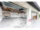 Spacious garage with overhead storage at 21445 Peachland Blvd, Port Charlotte, FL 33954