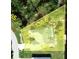 This aerial view showcases the property and its large lot size in a desirable location close to other homes and neighborhood amenities at 18882 Ayrshire Cir, Port Charlotte, FL 33948