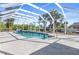 Relaxing screened pool with canal view at 18882 Ayrshire Cir, Port Charlotte, FL 33948