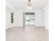 Bright Gathering room with tile floors and sliding glass doors to the pool at 18882 Ayrshire Cir, Port Charlotte, FL 33948