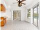 Spacious dining area with tile floors, sliding glass doors, and pool view at 18882 Ayrshire Cir, Port Charlotte, FL 33948