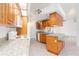 Bright kitchen with wood cabinets and granite counters at 18882 Ayrshire Cir, Port Charlotte, FL 33948
