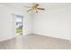 Bright bonus room with tile floors and sliding glass doors at 18882 Ayrshire Cir, Port Charlotte, FL 33948