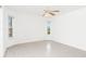 Spacious bedroom with tile flooring and large windows at 18882 Ayrshire Cir, Port Charlotte, FL 33948