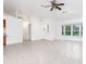 Spacious living room featuring tile flooring,high ceilings and multiple windows at 18882 Ayrshire Cir, Port Charlotte, FL 33948