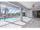 Spacious pool and patio area with screened enclosure at 18882 Ayrshire Cir, Port Charlotte, FL 33948