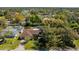Aerial view of single Gathering home with surrounding landscape at 1150 Winston St, Port Charlotte, FL 33952