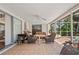 Screened patio with pool view and seating area at 1150 Winston St, Port Charlotte, FL 33952