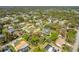Property lot view with surrounding houses and vegetations at 1150 Winston St, Port Charlotte, FL 33952