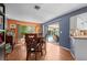 Bright dining area opens to the patio and pool at 1150 Winston St, Port Charlotte, FL 33952