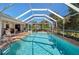 Enjoy this large screened pool with plenty of room for lounging at 1150 Winston St, Port Charlotte, FL 33952