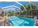 Refreshing screened pool, perfect for outdoor enjoyment at 1150 Winston St, Port Charlotte, FL 33952