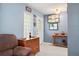 Entryway with wooden console table and comfortable seating at 1150 Winston St, Port Charlotte, FL 33952