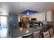 Kitchen with breakfast bar, stainless steel appliances and blue LED lighting at 6800 Placida Rd # 144, Englewood, FL 34224