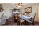 Charming dining room with a rustic wooden table and six chairs at 16115 Aralia Dr, Punta Gorda, FL 33955