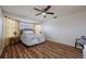 Cozy bedroom with wood-look floors and neutral color palette at 16115 Aralia Dr, Punta Gorda, FL 33955