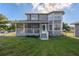 Two-story house with screened porch and attached garage at 16115 Aralia Dr, Punta Gorda, FL 33955