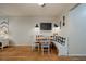 Cozy dining nook with a built-in bench, table, and chalkboard wall decor at 16115 Aralia Dr, Punta Gorda, FL 33955