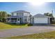 Two-story house with attached garage and spacious yard at 16115 Aralia Dr, Punta Gorda, FL 33955
