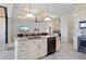Spacious kitchen with granite island, stainless steel appliances, and white cabinetry at 669 Monaco Dr, Punta Gorda, FL 33950
