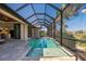 Enjoy this refreshing screened-in pool with a spa and a view of the golf course at 669 Monaco Dr, Punta Gorda, FL 33950