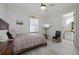 Spacious bedroom with a king-size bed and en-suite bathroom at 669 Monaco Dr, Punta Gorda, FL 33950