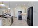 Modern kitchen with stainless steel appliances and custom cabinetry at 669 Monaco Dr, Punta Gorda, FL 33950