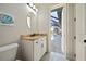 Convenient half-bathroom with pool view at 669 Monaco Dr, Punta Gorda, FL 33950