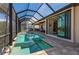 Large screened-in pool and spa with access from the lanai at 669 Monaco Dr, Punta Gorda, FL 33950