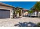 Two-story house with three-car garage, paver driveway, and landscaping at 669 Monaco Dr, Punta Gorda, FL 33950