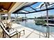 Stunning pool and spa with canal views and covered lanai at 1700 Los Alamos Dr, Punta Gorda, FL 33950