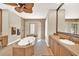 Bathroom with soaking tub, double vanity and walk-in shower at 1700 Los Alamos Dr, Punta Gorda, FL 33950