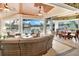 Relaxing patio with wicker furniture and stunning water views at 1700 Los Alamos Dr, Punta Gorda, FL 33950