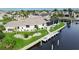 Luxury home on a private lot with canal access, plenty of outdoor space, and mature landscaping at 1700 Los Alamos Dr, Punta Gorda, FL 33950