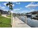 Private dock with pathway and lighting, providing easy access to the canal at 1700 Los Alamos Dr, Punta Gorda, FL 33950
