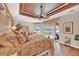 Main bedroom with hardwood floors and access to a balcony at 1700 Los Alamos Dr, Punta Gorda, FL 33950