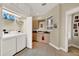 Bright laundry room with washer, dryer, and additional counter space at 1700 Los Alamos Dr, Punta Gorda, FL 33950