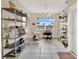 Bright and airy home office with ample shelving and workspace at 1700 Los Alamos Dr, Punta Gorda, FL 33950