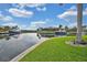 Scenic waterfront view with lush landscaping at 1700 Los Alamos Dr, Punta Gorda, FL 33950