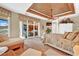 Main bedroom with sitting area and water views at 1700 Los Alamos Dr, Punta Gorda, FL 33950