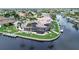 Expansive waterfront property with a large pool, spa, and private dock at 1700 Los Alamos Dr, Punta Gorda, FL 33950