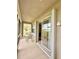 Spacious screened-in porch with table and chairs, access to backyard at 24479 Vienison Ln, Punta Gorda, FL 33955