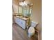 Double vanity bathroom with granite countertop at 24479 Vienison Ln, Punta Gorda, FL 33955
