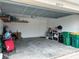 Spacious two-car garage with shelving, tools and storage at 24479 Vienison Ln, Punta Gorda, FL 33955