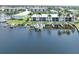 Aerial view of waterfront property with boat slips and community at 3600 Bal Harbor Blvd # 1G, Punta Gorda, FL 33950