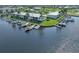Aerial view showcasing waterfront property with numerous boats and docks at 3600 Bal Harbor Blvd # 1G, Punta Gorda, FL 33950