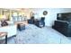 Relaxing living room featuring a large TV and comfortable seating at 3600 Bal Harbor Blvd # 1G, Punta Gorda, FL 33950