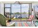 Relaxing screened porch overlooking the water at 3600 Bal Harbor Blvd # 1G, Punta Gorda, FL 33950