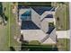 Top-down view of single-Gathering home with tile roof and pool at 3853 Bordeaux Dr, Punta Gorda, FL 33950